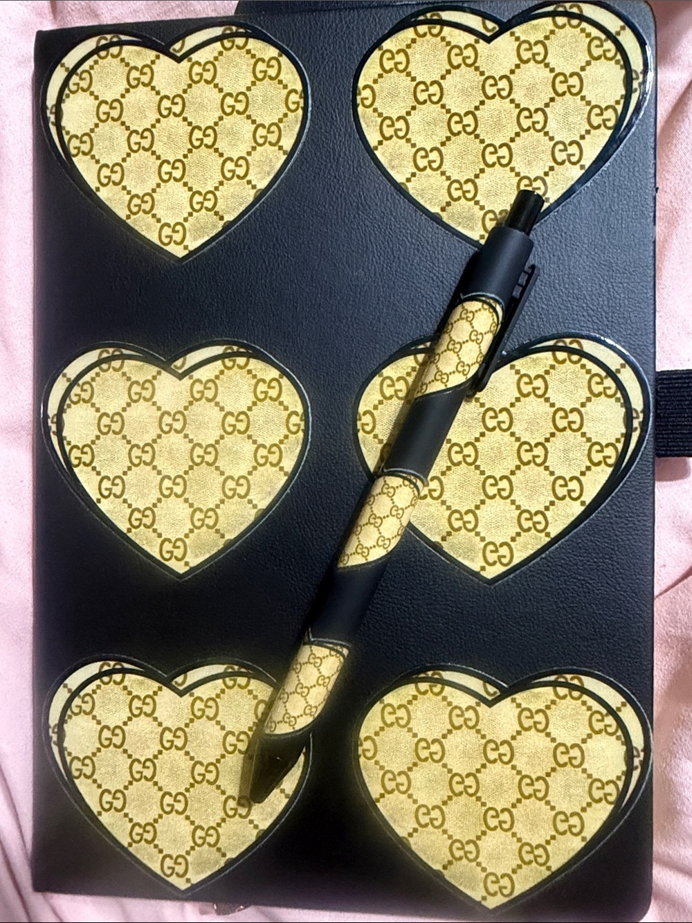 Black journal with Gold Heart Inlays and Matching Pen and bookmark.